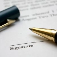 Signature de la caution sous la mention manuscrite