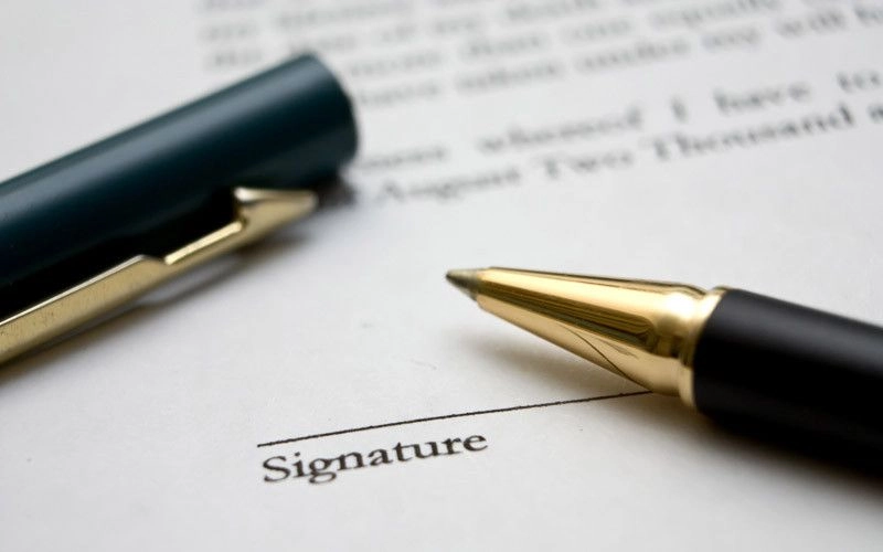 Signature de la caution sous la mention manuscrite